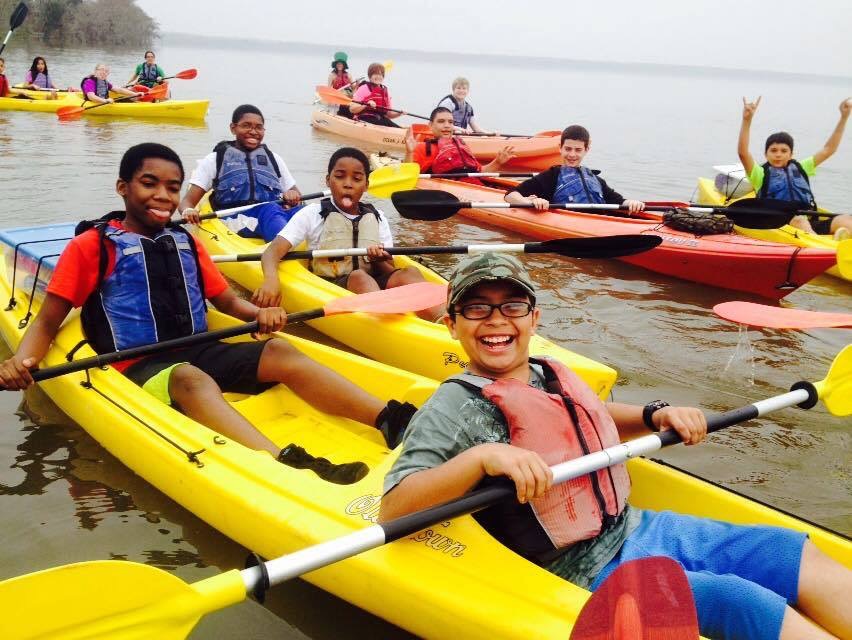kayak kids smiling faces